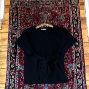 Black Halston short sleeved shirt, size medium with tie front bow